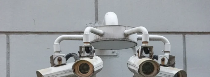 best security cameras for business - An octopus like contraption holds six surveillance cameras in downtown Singapore.