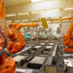 robotic process automation hardware lease - Automatic robots in the industrial factory for assembly automotive products, automotive concept