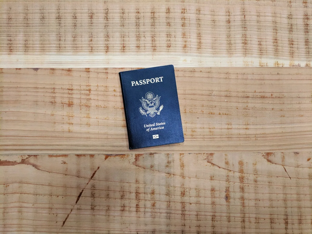 how long does it take to get a passport - There were no U.S. Passport photos that I could find on Unsplash so I pulled mine out and took this picture with my Pixel XL.