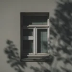 how to activate windows 10 - Shadow from a tree on the facade with a window.